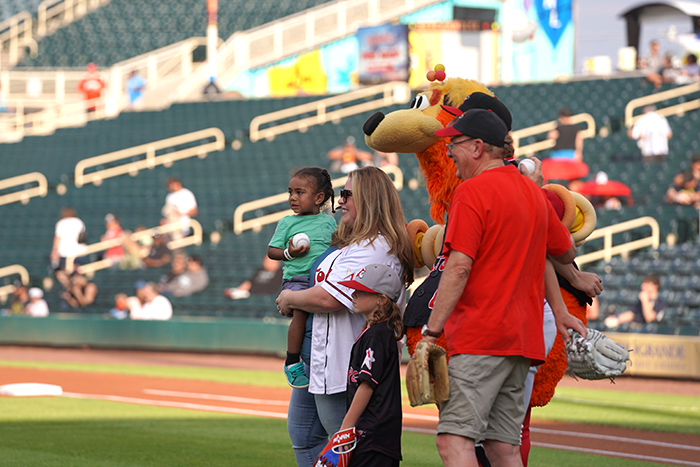 Dez and Ezra throw out the first pitch.